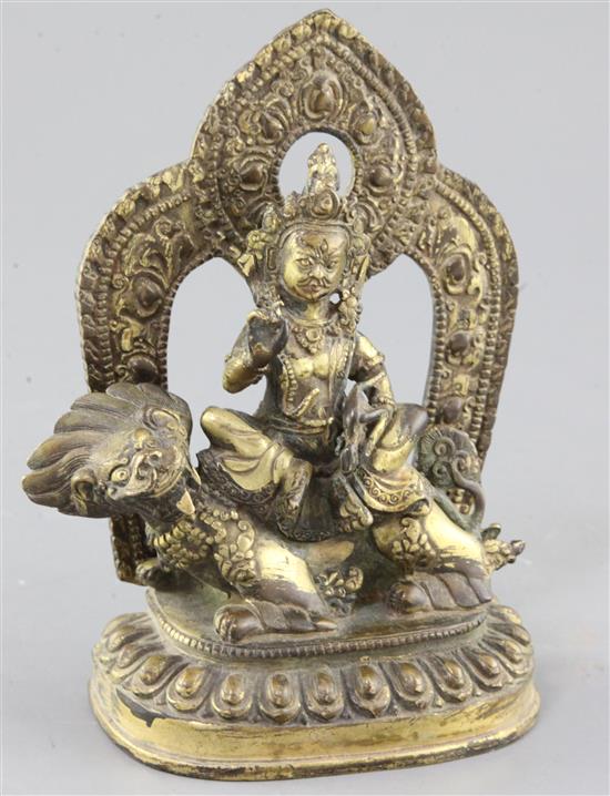 A Tibetan gilt bronze figure of Vaishravana, height 17.5cm